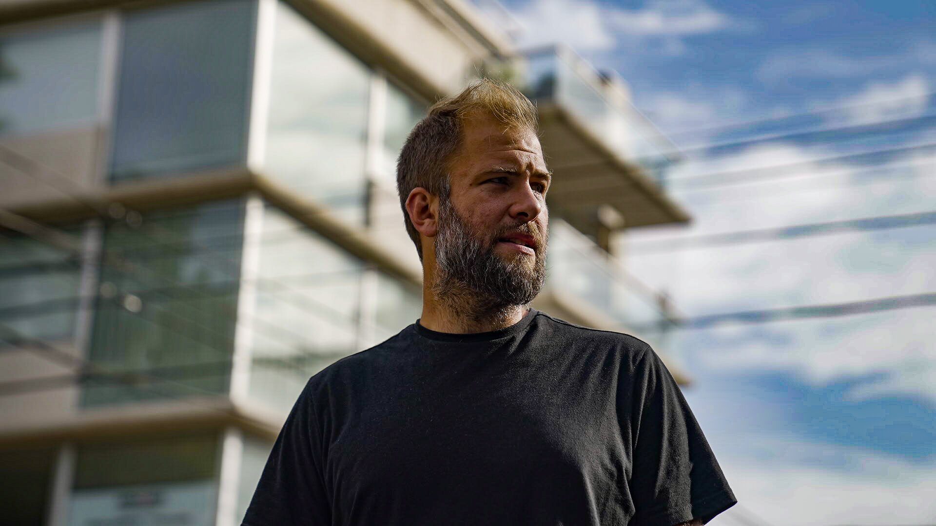 Director Lucas Murillo looks to the side
