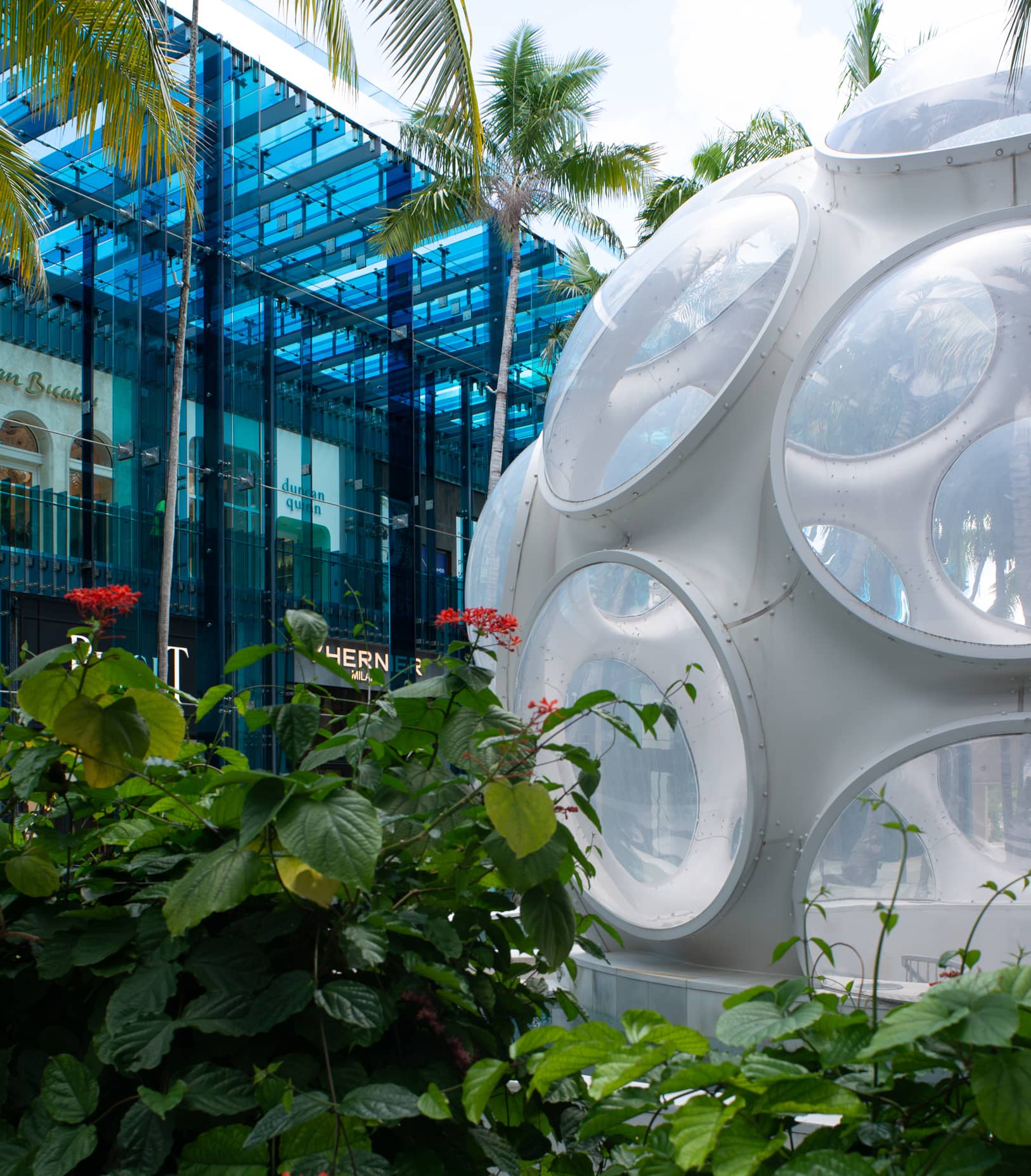 Gardens, sculpture and stores at The Miami Design District