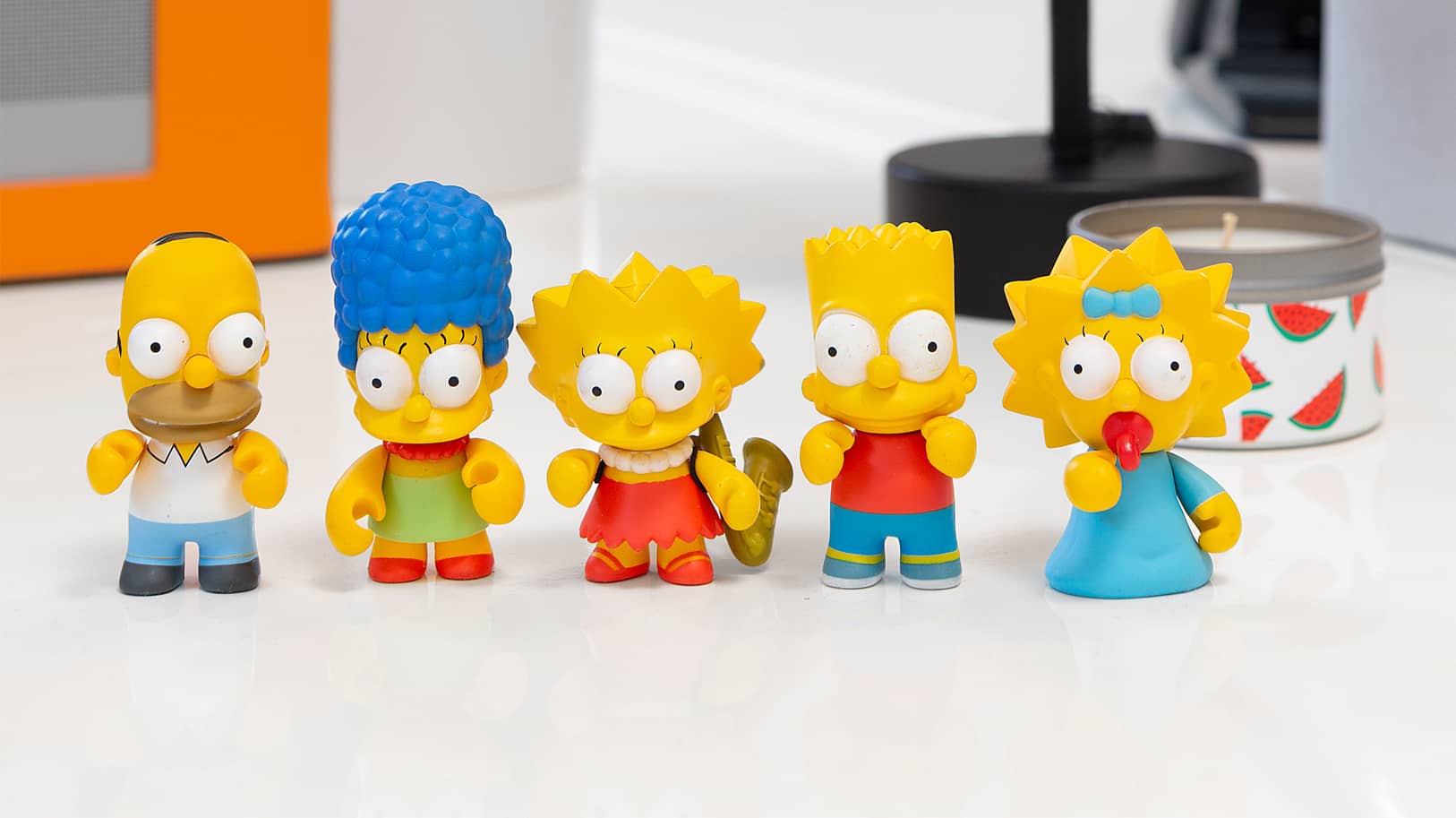 The Simpsons toy figurines on a studio desktop | Think Twice studio